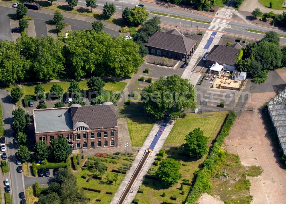 Oberhausen from the bird's eye view: Historic buildings Steigerhaus and Torhaus at the edge of OLGA Park in the borough of Osterfeld in Oberhausen in the state of North Rhine-Westphalia. CONTACT GmbH is located in Steigerhaus and a restaurant in Torhaus