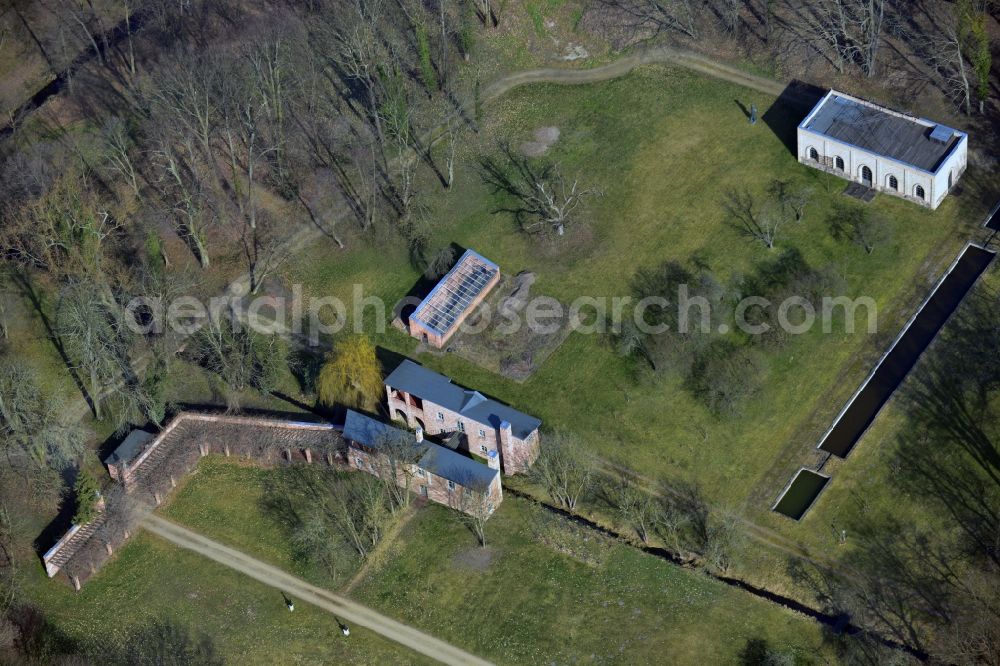 Aerial photograph Märkisch Wilmersdorf - The historic nursery belongs next to the castle and the farmyard with the ensemble of buildings in the castle park Maerkisch Wilmersdorf in Trebbin in the state of Brandenburg. The restoration of the castle park is considered an architectural and historical monument of garden view as exemplary. The site is not public!