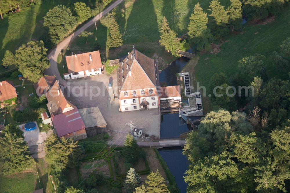 Aerial image Scheibenhardt - Historic watermill on a farm homestead in the district Bienwaldmuehle in Scheibenhardt in the state Rhineland-Palatinate