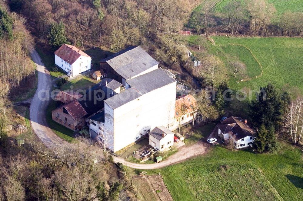 Kandel from above - Historic watermill on a farm homestead on the edge of cultivated meadows in Kandel in the state Rhineland-Palatinate