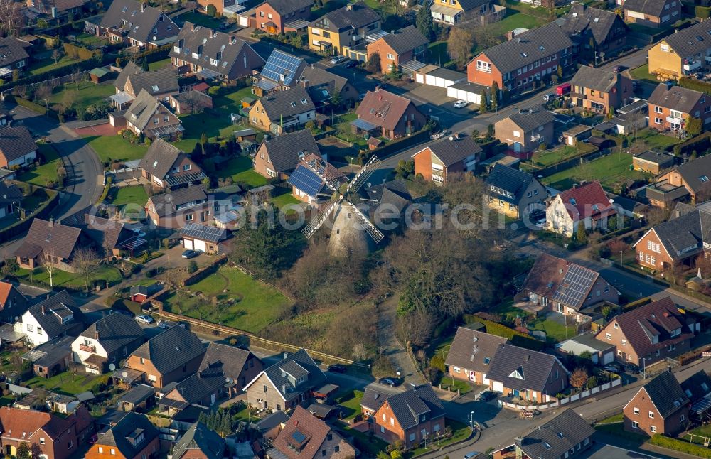 Anholt from the bird's eye view: Historic windmill in a residential area in Anholt in the state of North Rhine-Westphalia