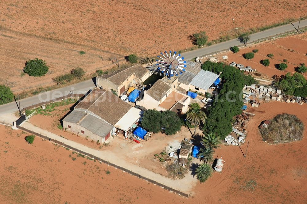 Aerial photograph Campos - Historic windmill on a farm homestead on the edge of cultivated fields in Campos in Balearic Islands, Mallorca, Spain