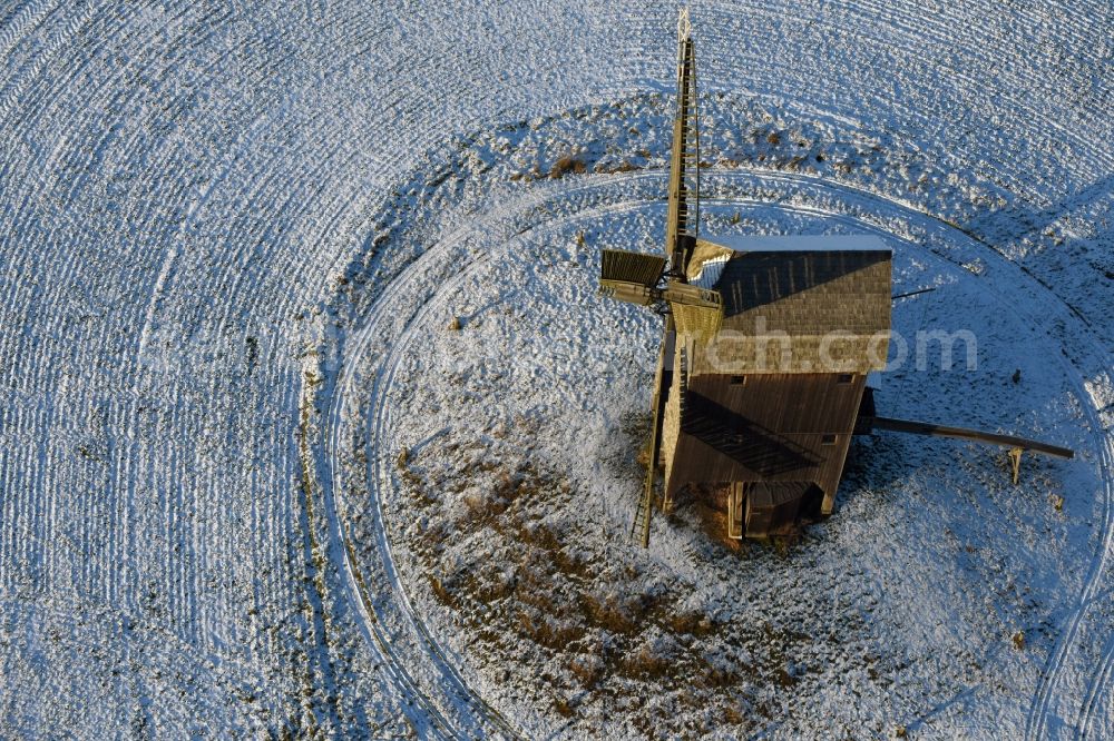 Aerial image Beetzseeheide - Historic windmill on a farm homestead on the edge of cultivated fields in Ketzuer in the state Brandenburg