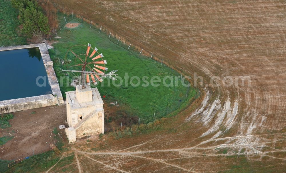 Aerial photograph Manacor - Historic windmill on a farm homestead on the edge of cultivated fields in Manacor in Balearic Islands, Mallorca, Spain