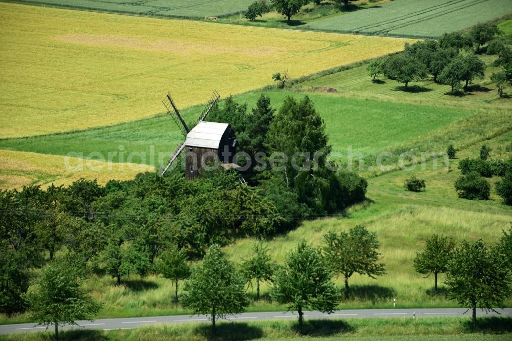 Aerial image Sargstedt - Historic windmill on a farm homestead on the edge of cultivated fields in Sargstedt in the state Saxony-Anhalt