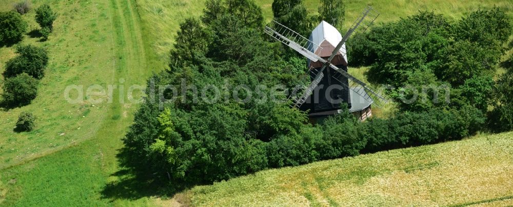 Sargstedt from above - Historic windmill on a farm homestead on the edge of cultivated fields in Sargstedt in the state Saxony-Anhalt