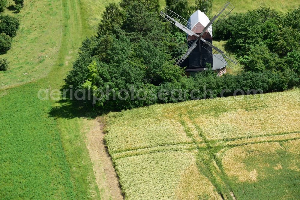 Sargstedt from the bird's eye view: Historic windmill on a farm homestead on the edge of cultivated fields in Sargstedt in the state Saxony-Anhalt