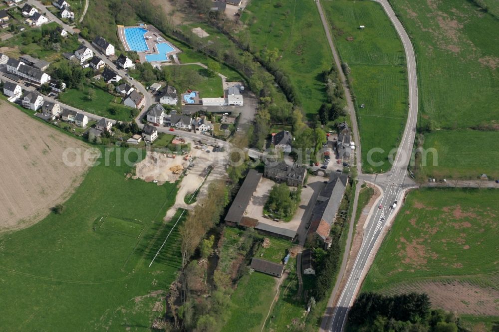 Aerial image Mertesdorf - Historic estate in Mertesdorf in the state of Rhineland-Palatinate. Mertesdorf is a wine-growing village in the valley of the river Ruwer near Trier and an official resort. The village is surrounded by vineyards and hills and consists of historic and residential buildings