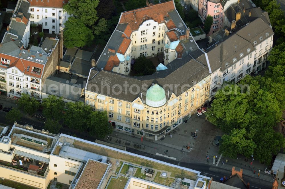 Berlin from above - Historic office, business and residential building on Schlossstrasse in the Steglitz part in Berlin in Germany. The building with its distinct dome is located on the Hermann-Ehlers Square park and includes a yard