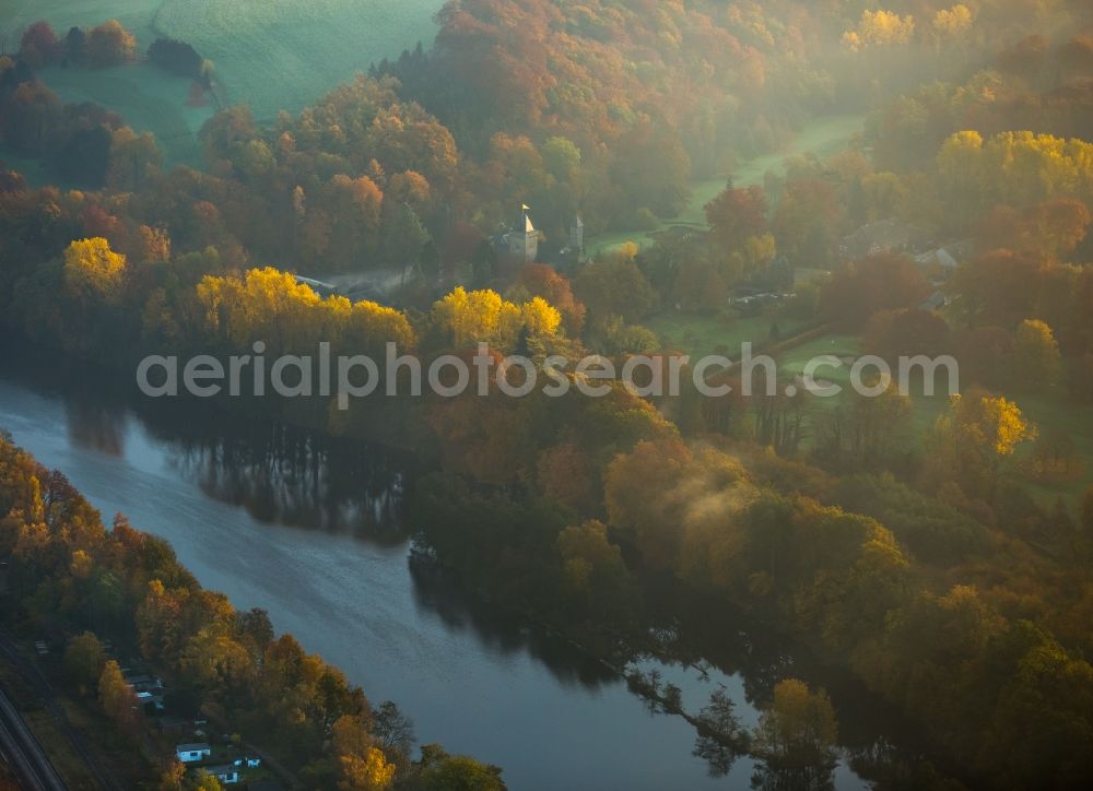 Essen from above - Historic clubhouse on the grounds of the Golf course of the Golf Club Haus Oefte e.V. on the autumnal riverbank of the Ruhr in Essen in the state of North Rhine-Westphalia