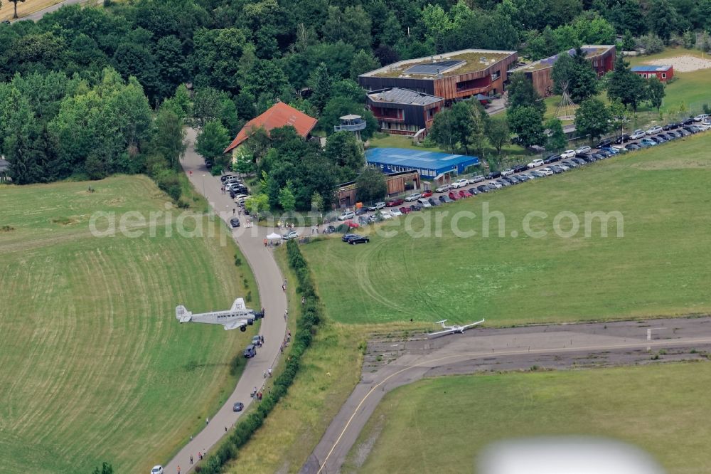 Aerial image Oberschleißheim - Historic aircraft Junkers 52 on approach to landing in Oberschleissheim in the state Bavaria, Germany