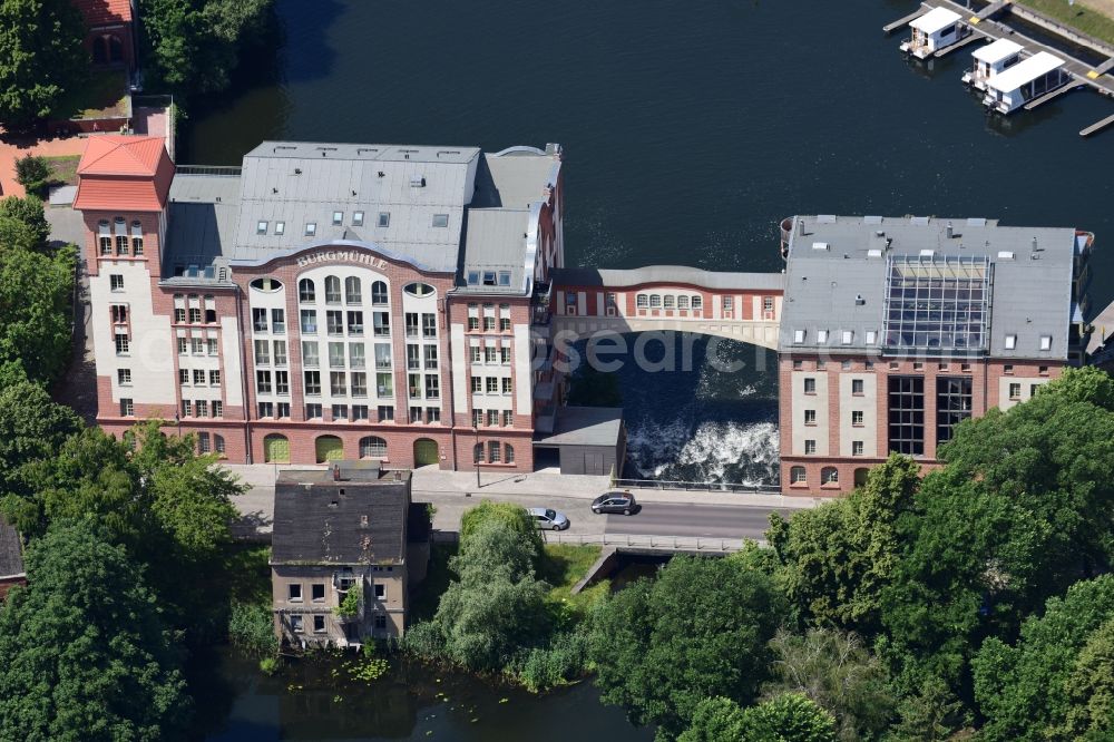 Brandenburg an der Havel from above - Historical building Burgmuehle in Brandenburg an der Havel in the state Brandenburg over the course of the river Domstreng with condominiums, assisted living and holiday apartments