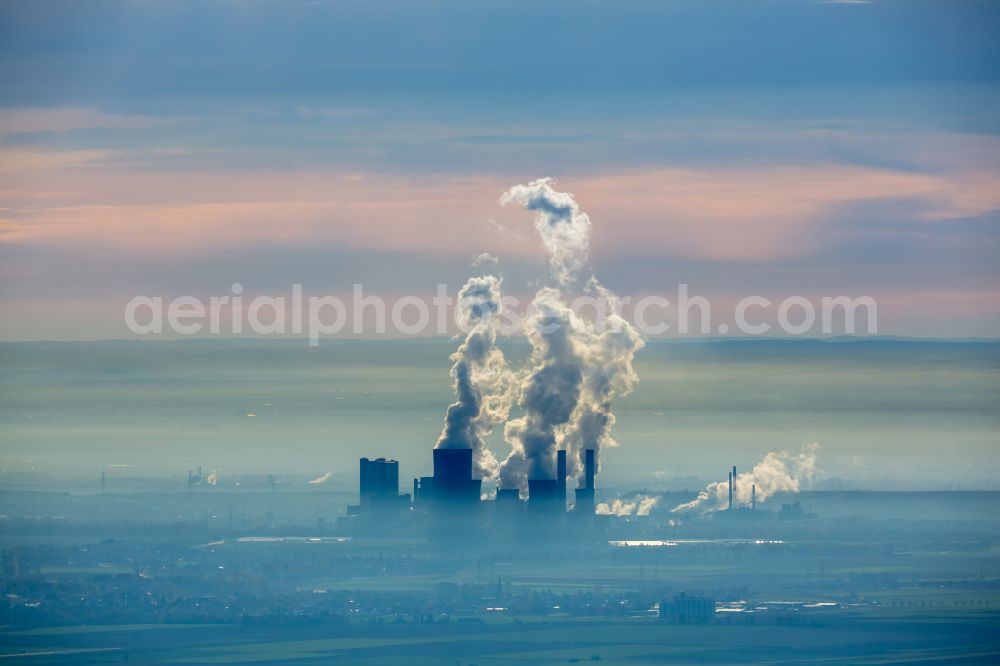 Grevenbroich from the bird's eye view: Building and hall construction of the HKW combined heat and power plant and coal-fired power plant RWE Power AG in the district Frimmersdorf in Grevenbroich in the state North Rhine-Westphalia, Germany