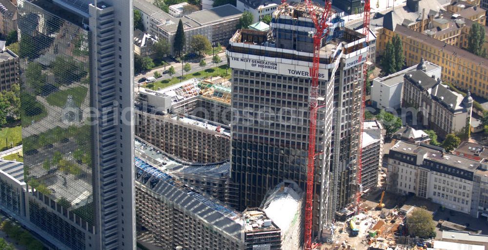 Aerial photograph Frankfurt am Main - Blick auf die Baustelle des Tower 185 , dem derzeit höchstem, in Deutschland im Bau befindlichen Wolkenkratzer. Bauherr ist die Vivico Real Estate. Die Wirtschaftsprüfungsgesellschaft PricewaterhouseCoopers (PwC) hat bereits vor Baubeginn 60.000 Quadratmeter von insgesamt rund 90.000 Quadratmeter Bürofläche langfristig angemietet und wird hier ihre neue Deutschland-Zentrale beziehen. Den Entwurf für den Tower 185 lieferte der Frankfurter Architekt Christoph Mäckler. Er sieht ein hufeisenförmig angelegtes Sockelgebäude vor, aus dem sich die beiden Hochhaushälften mit einer Aluminium-Glas-Fassade erheben. View of the construction site of Tower 185, currently the highest in Germany under construction skyscraper. Owner is the Vivico real estate.