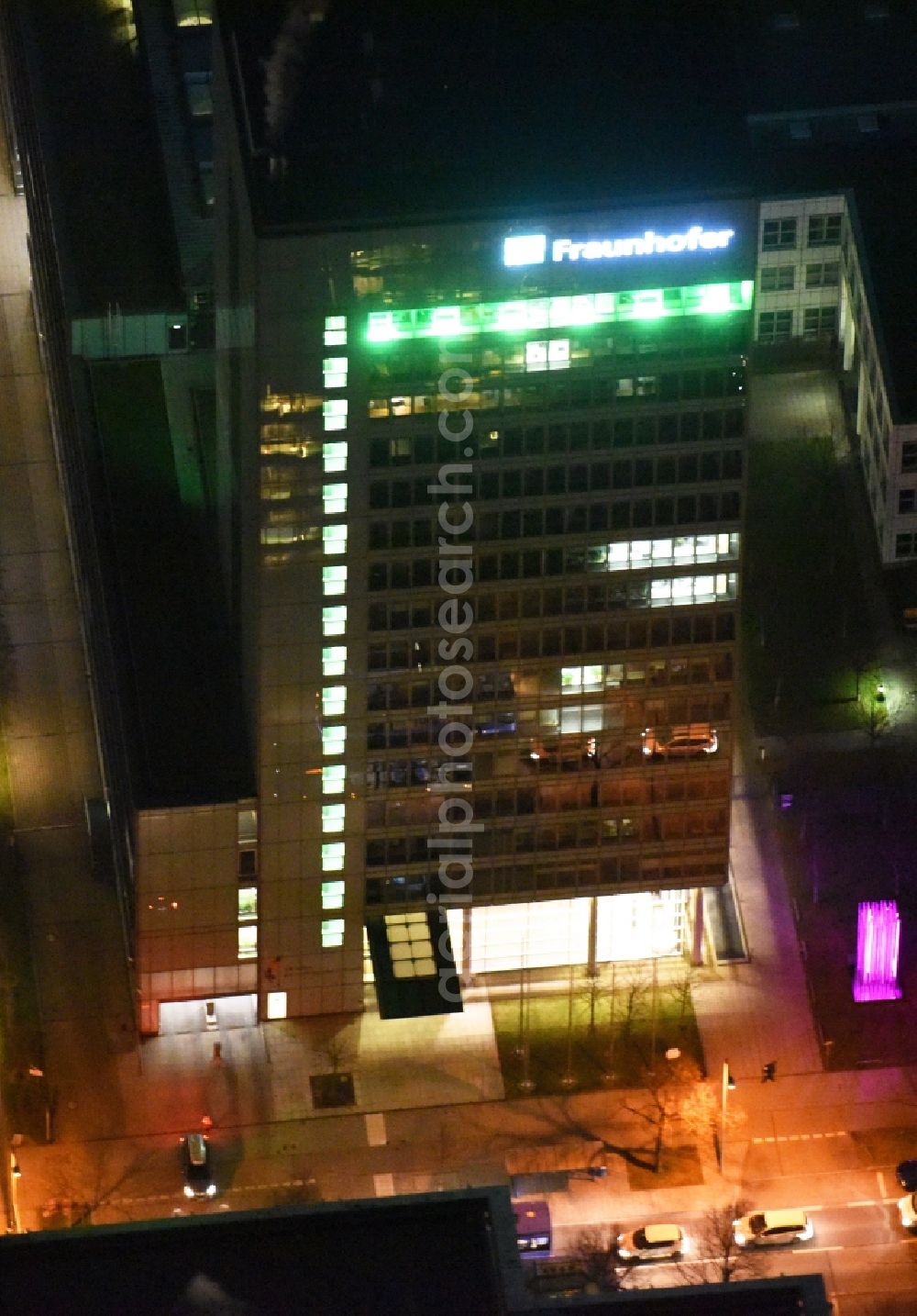 München from the bird's eye view: Night view High-rise ensemble of Fraunhofer-Institut fuer Zuverlaessigkeit und Mikrointegration IZM on Hansastrasse in Munich in the state Bavaria