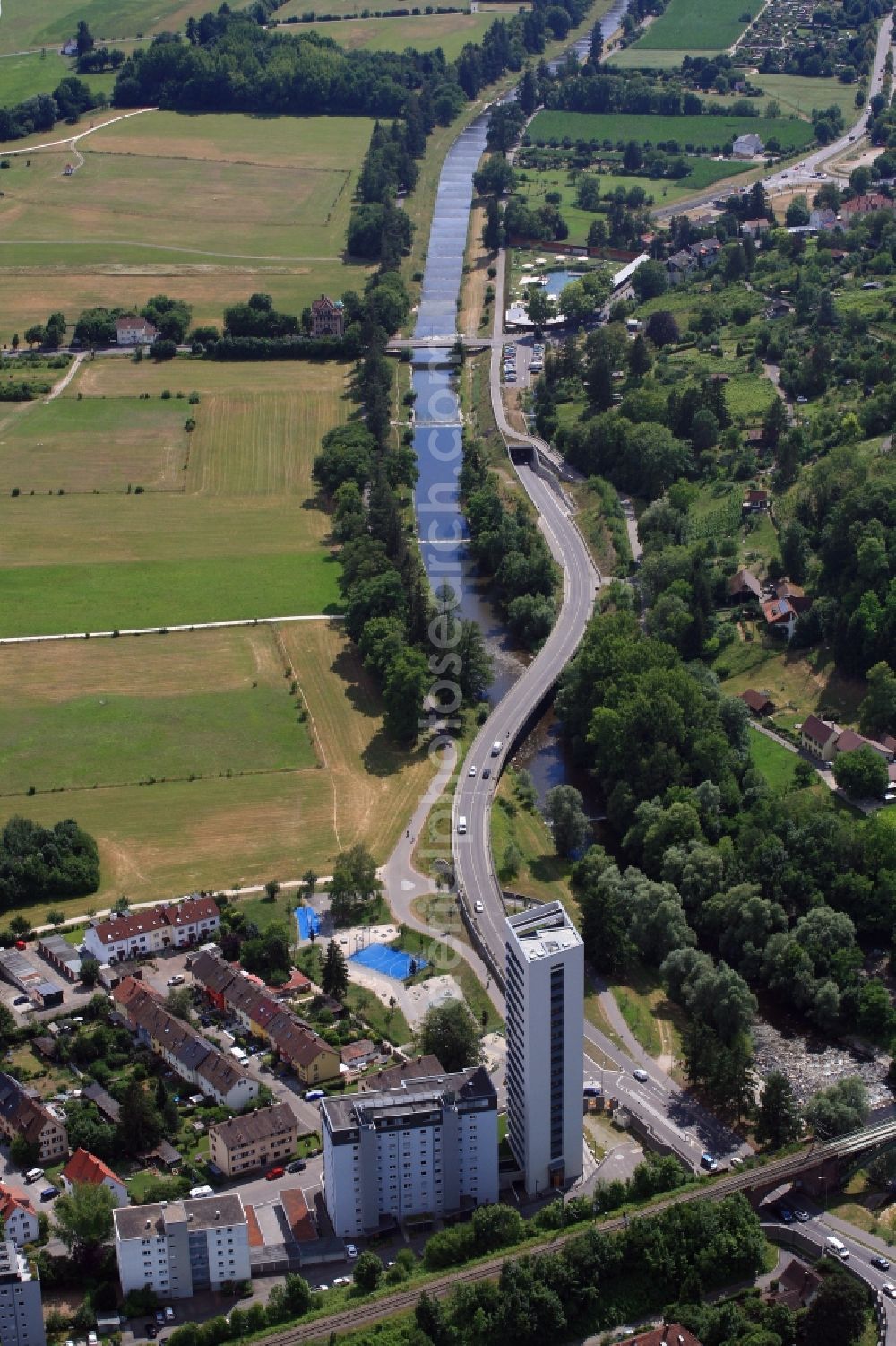 Aerial image Lörrach - High-rise ensemble of Wohnbau Loerrach at the border to Switzerland in Loerrach in the state Baden-Wurttemberg, Germany. Looking allong the river Wiese