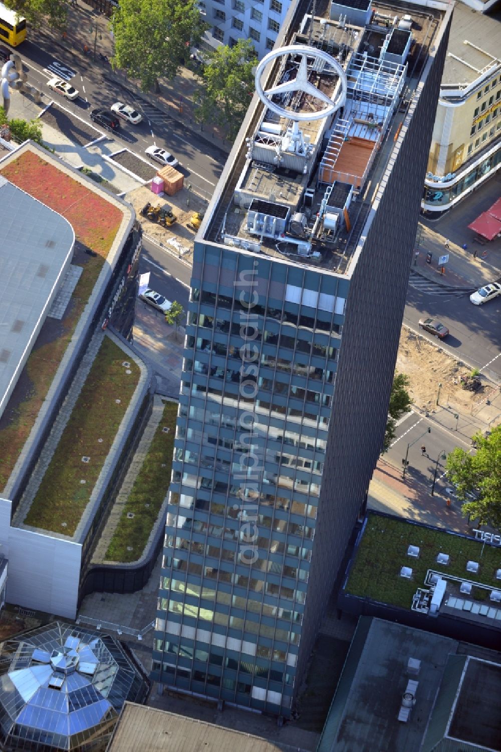 Berlin from the bird's eye view: View ofEuropa-Center in Berlin-Charlottenburg. This office and shopping center, built in 1963, is the symbol of West Berlin. It consists of the shopping center with about 70 shops, numerous restaurants, a bank, the cabaret The porcupine, the Office Tower and the Palace with its famous restaurant, First Floor