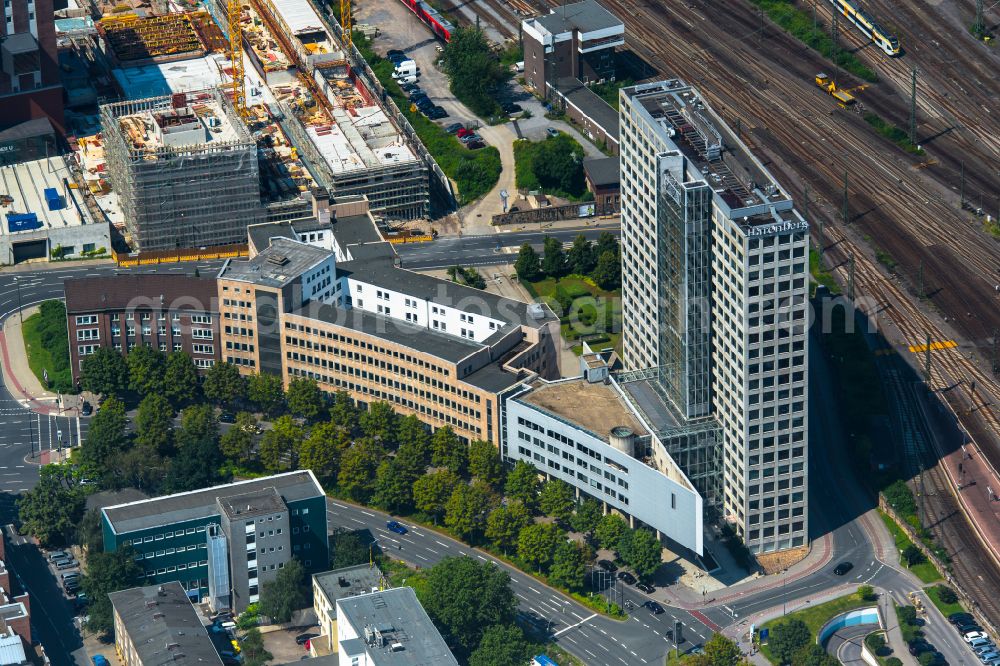 Dortmund from above - High-rise buildings of the company HCC Management GmbH beneath some rails of the Deutsche Bahn AG and besides the road Koenigswall in Dortmund at Ruhrgebiet in the state North Rhine-Westphalia