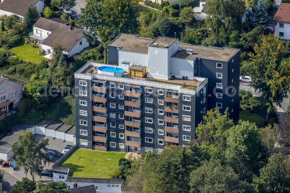 Ennepetal from the bird's eye view: High-rise building with a rooftop pool in the residential area on Sonnenweg in Ennepetal in the state North Rhine-Westphalia, Germany