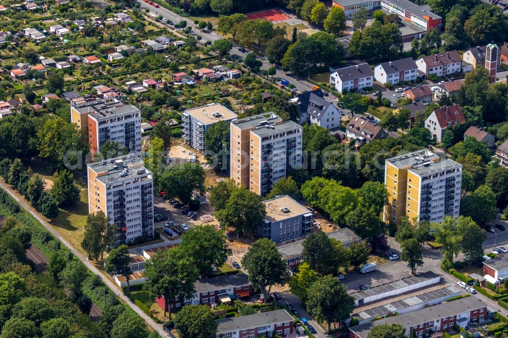 Aerial image Dortmund - High-rise building in the residential area with colorful horse motifs as facade cladding on street Espenstrasse in Dortmund at Ruhrgebiet in the state North Rhine-Westphalia, Germany