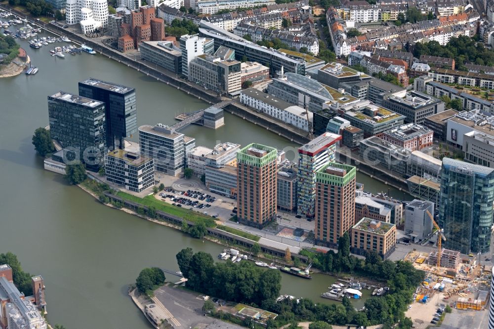 Düsseldorf from above - High-rise building complex Duesseldorfer Heimathafen of the project WIN WIN on Speditionstrasse in Duesseldorf at Ruhrgebiet in the state North Rhine-Westphalia, Germany