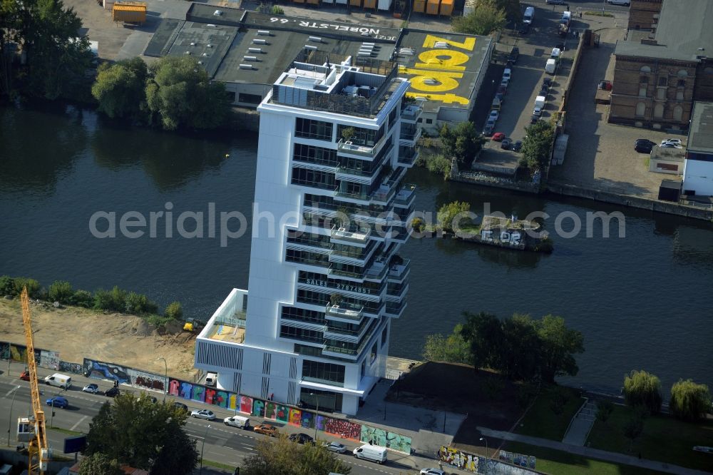 Berlin from above - Project Living Levels at Muhlenstrasse on the banks of the River Spree in Berlin - Friedrichshain. On the grounds of the Berlin Wall border strip at the EastSideGallery, the company Living Bauhaus is building a futuristic high-rise residential. The real estate service company City & Home GmbH manages the available apartments