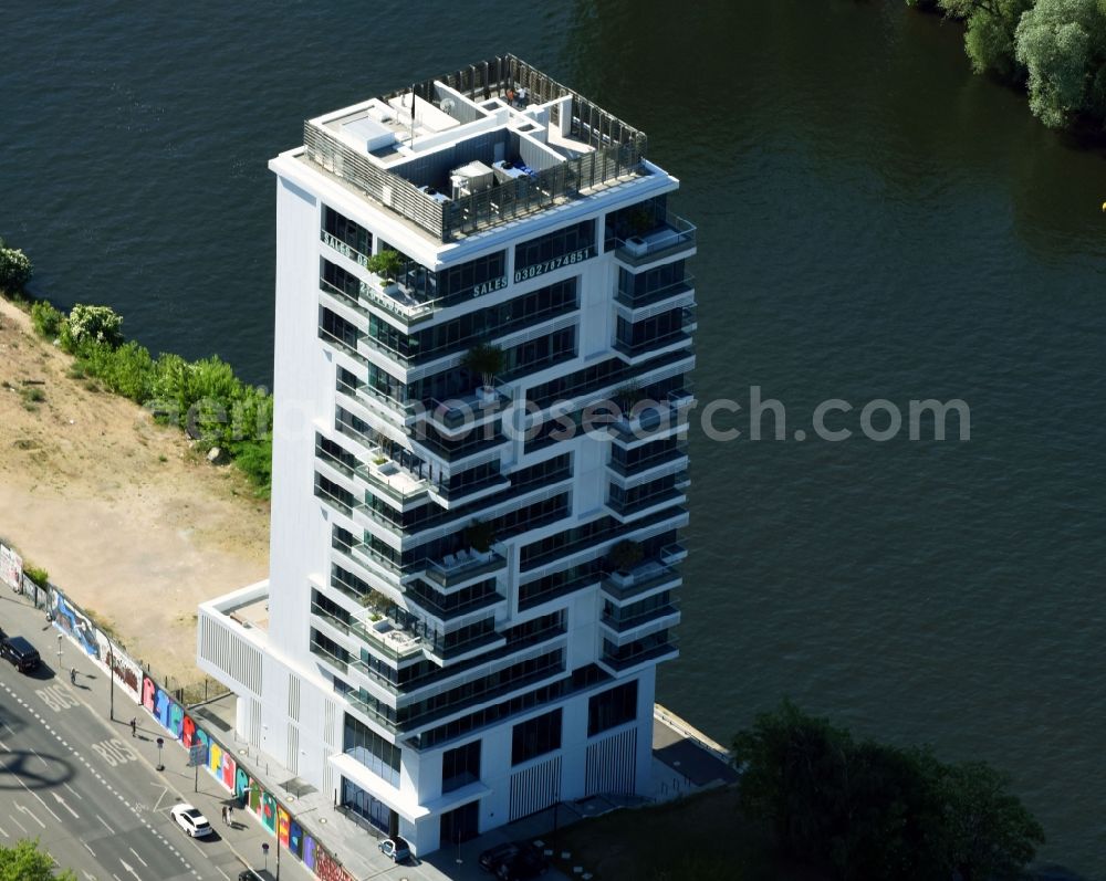 Berlin from above - Project Living Levels at Muhlenstrasse on the banks of the River Spree in Berlin - Friedrichshain. On the grounds of the Berlin Wall border strip at the EastSideGallery, the company Living Bauhaus is building a futuristic high-rise residential. The real estate service company City & Home GmbH manages the available apartments