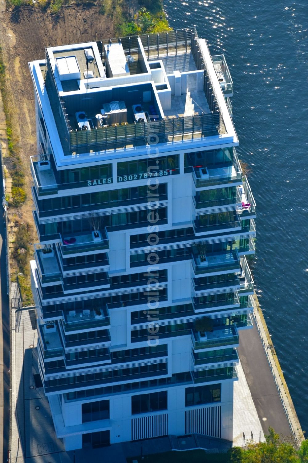 Berlin from above - Project Living Levels at Muhlenstrasse on the banks of the River Spree in Berlin - Friedrichshain. On the grounds of the Berlin Wall border strip at the EastSideGallery, the company Living Bauhaus is building a futuristic high-rise residential. The real estate service company City & Home GmbH manages the available apartments