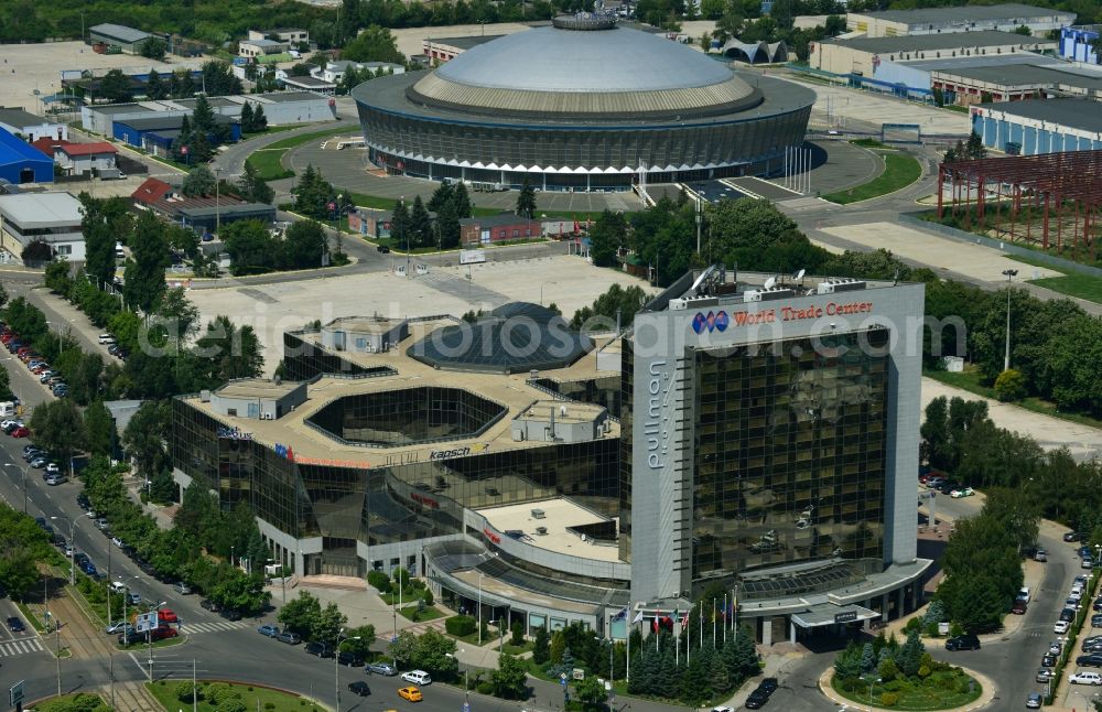 Aerial image Bukarest - High-rise building of the Hotel Pullman Bucharest with the World Trade Center office complex at the Montreal square in Bucharest, Romania