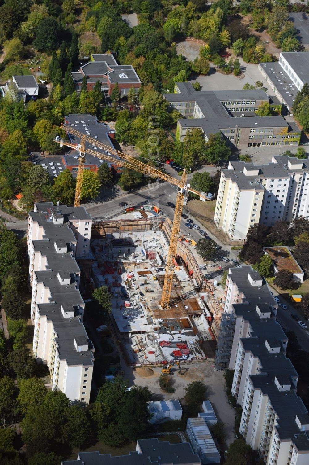 Berlin from above - High-rise construction site for a new residential and commercial building Theodor-Loos-Weg corner Wutzkyallee in the district Buckow in Berlin, Germany