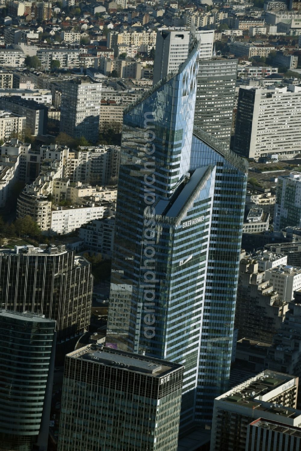 Paris from the bird's eye view: Roof and top of the highrise building Tour First on the Eastern End of the La Defense quarter in Paris in Ile-de-France, France