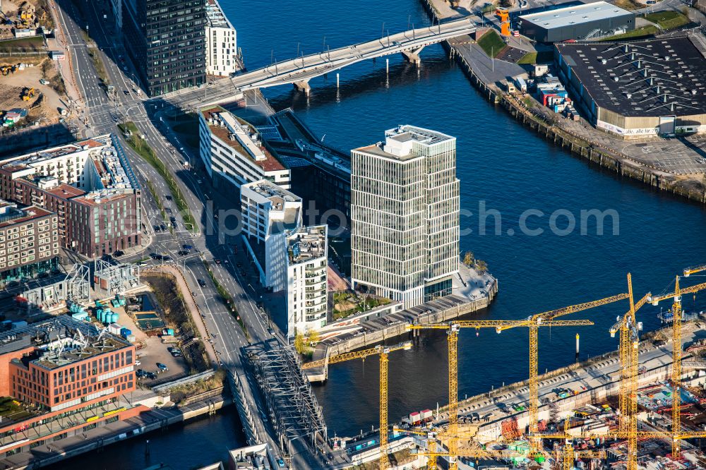 Hamburg from the bird's eye view: High-rise building WATERMARK and office and commercial building Intelligent Quarters on Buenos-Aires-Kai - Ueberseeallee in Hafen City in Hamburg, Germany