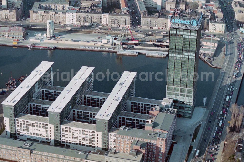 Berlin from above - Office buildings and commercial high-rise complex Treptower on street An den Treptowers in the district Treptow in Berlin, Germany