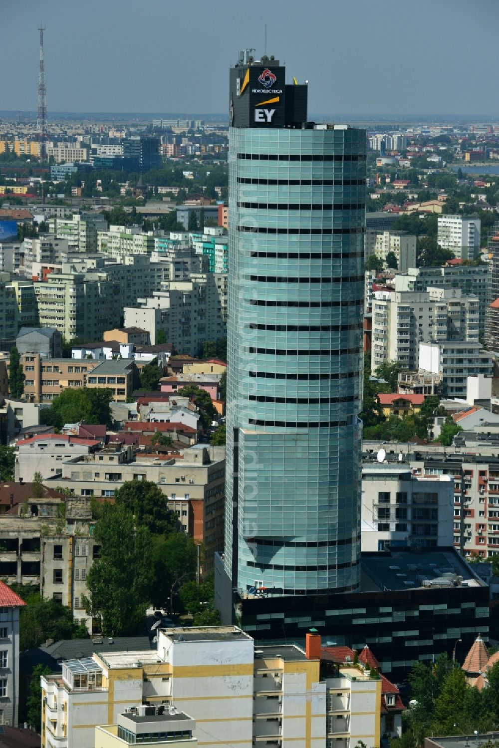 Bukarest from above - High-rise building of Bucharest Tower Center BTC Avrig 35 Group in the city center of the capital Bucharest in Romania. The accounting firm Ernst & Young EY here has your country seat