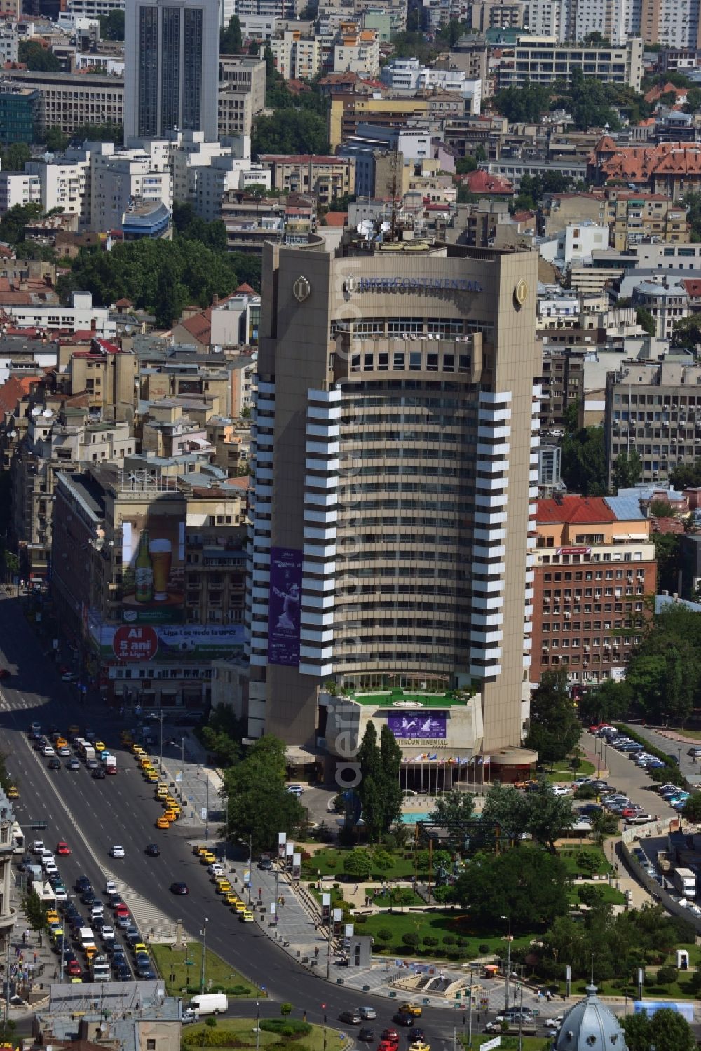 Aerial photograph Bukarest - High-rise building of the Intercontinental Hotel on Bulevardul Nicolae Balcescu in the city center of the capital, Bucharest, Romania