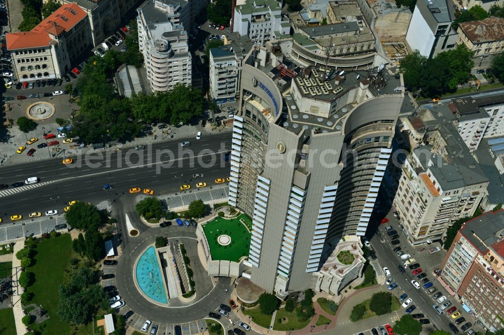 Aerial image Bukarest - High-rise building of the Intercontinental Hotel on Bulevardul Nicolae Balcescu in the city center of the capital, Bucharest, Romania