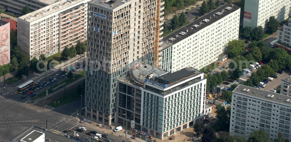 Berlin from the bird's eye view: Blick auf die Hochhaus- Baustelle Mollstraße 31 Ecke Otto-Braun-Straße für das neue Wohn- und Geschäftshaus Königstadt- Carree . Rechts daneben entsteht das neue ETAP Hotel. View of the high-rise construction on the corner of Otto-Braun-Strasse for the new residential and commercial building. To the right stands the new ETAP hotel.