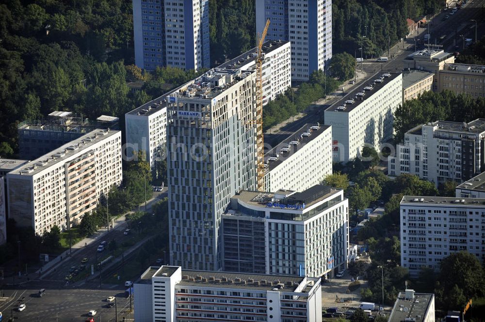 Berlin from the bird's eye view: Blick auf die Hochhaus- Baustelle Mollstraße 31 Ecke Otto-Braun-Straße für das neue Wohn- und Geschäftshaus Königstadt- Carree . Rechts daneben entsteht das neue ETAP Hotel. View of the high-rise construction on the corner of Otto-Braun-Strasse for the new residential and commercial building. To the right stands the new ETAP hotel.