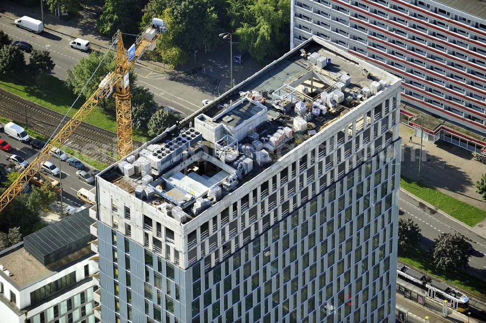 Berlin from the bird's eye view: Blick auf die Hochhaus- Baustelle Mollstraße 31 Ecke Otto-Braun-Straße für das neue Wohn- und Geschäftshaus Königstadt- Carree . Rechts daneben entsteht das neue ETAP Hotel. View of the high-rise construction on the corner of Otto-Braun-Strasse for the new residential and commercial building. To the right stands the new ETAP hotel.