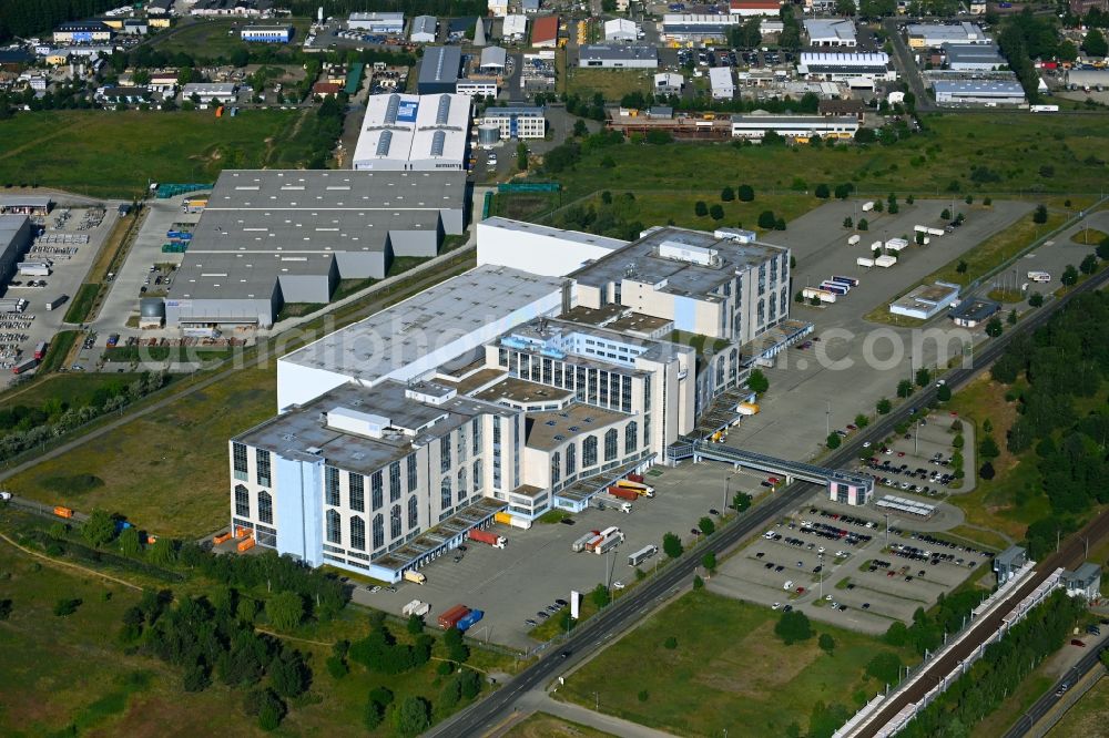 Aerial photograph Falkensee - High-bay warehouse building complex and logistics center on the premises of eCom Logistik GmbH on Str. of Einheit in Falkensee in the state Brandenburg, Germany