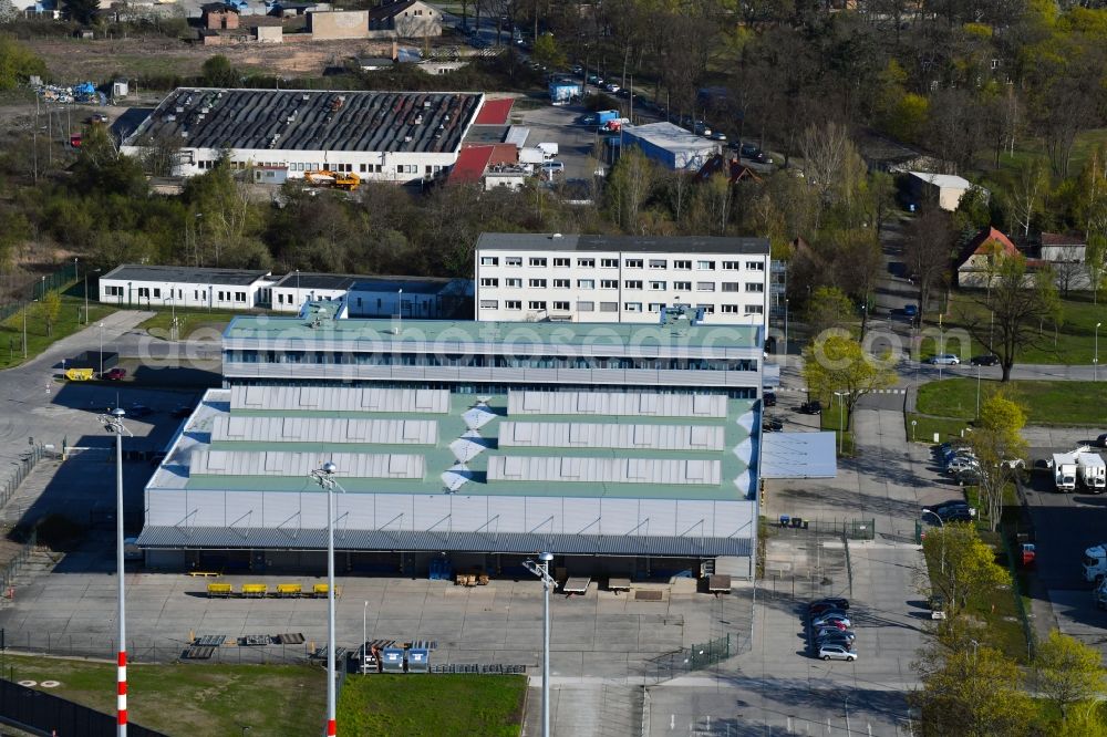 Aerial image Schönefeld - High-bay warehouse building complex and logistics center on the premises TNT on Kirchstrasse in Schoenefeld in the state Brandenburg, Germany