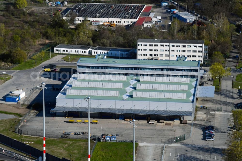 Aerial photograph Schönefeld - High-bay warehouse building complex and logistics center on the premises TNT on Kirchstrasse in Schoenefeld in the state Brandenburg, Germany