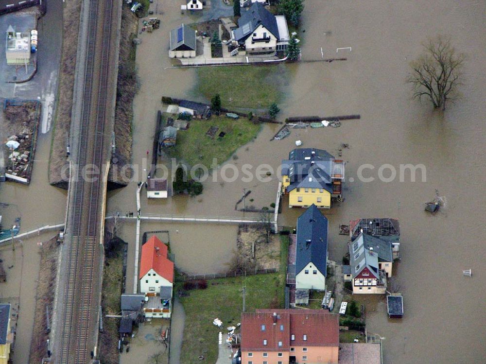 Bad Schandau from the bird's eye view: 31.03.2006 Bad Schandau; Hochwasser in Bad Schandau durch die Elbe entland der Bahnstrecke nach Krippen.