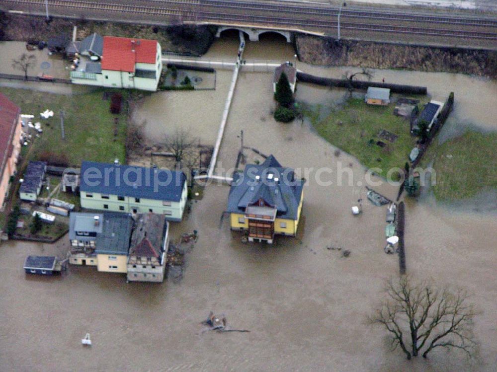 Aerial photograph Bad Schandau - 31.03.2006 Bad Schandau; Hochwasser in Bad Schandau durch die Elbe entland der Bahnstrecke nach Krippen.