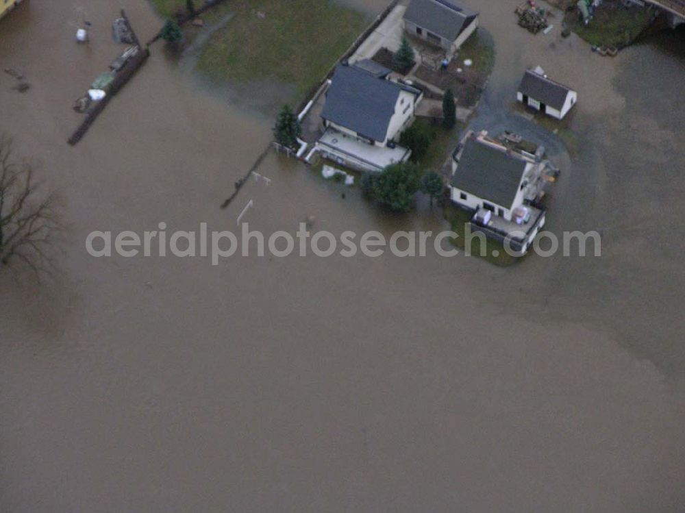 Bad Schandau from the bird's eye view: 31.03.2006 Bad Schandau; Hochwasser in Bad Schandau durch die Elbe entland der Bahnstrecke nach Krippen.