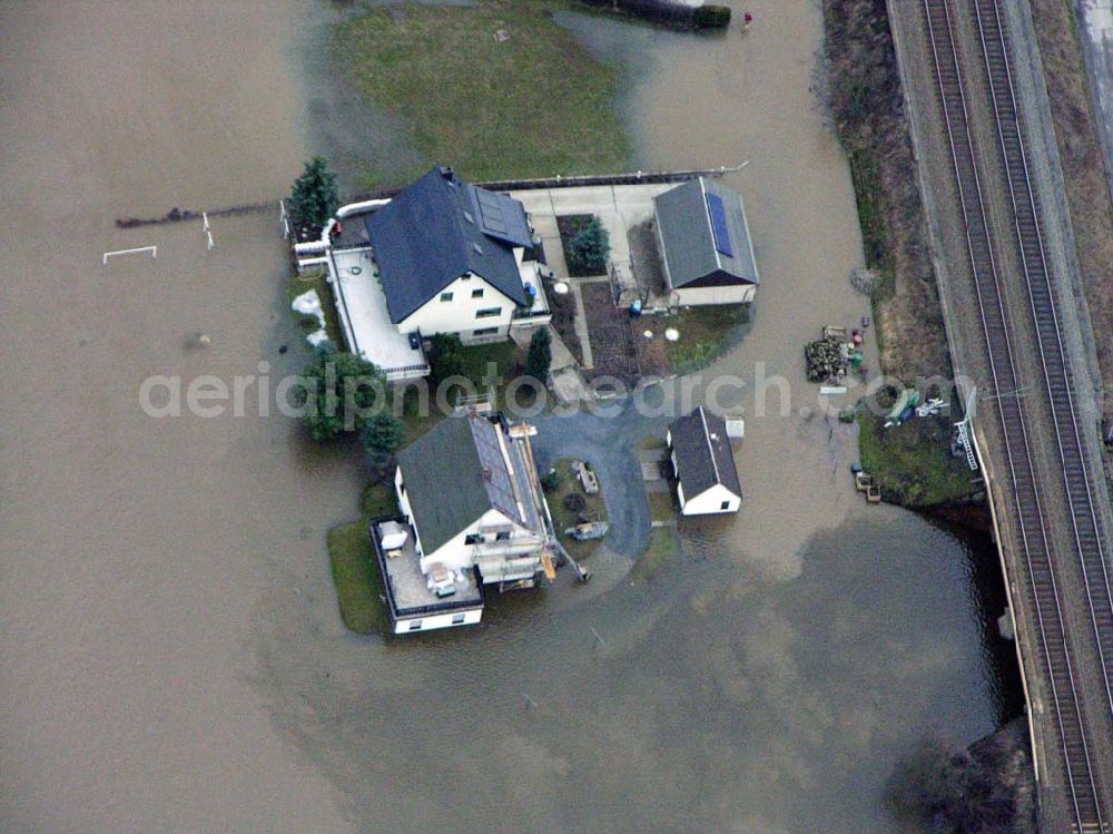 Aerial image Bad Schandau - 31.03.2006 Bad Schandau; Hochwasser in Bad Schandau durch die Elbe entland der Bahnstrecke nach Krippen.