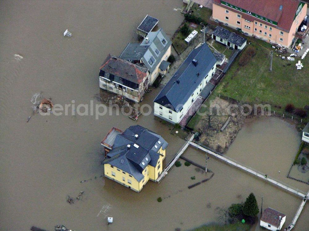 Aerial photograph Bad Schandau - 31.03.2006 Bad Schandau; Hochwasser in Bad Schandau durch die Elbe entland der Bahnstrecke nach Krippen.