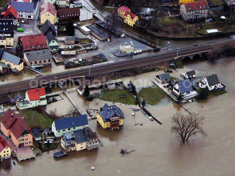 Aerial image Bad Schandau - 31.03.2006 Bad Schandau; Hochwasser in Bad Schandau durch die Elbe entland der Bahnstrecke nach Krippen.