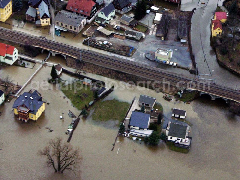 Aerial photograph Bad Schandau - 31.03.2006 Bad Schandau; Hochwasser in Bad Schandau durch die Elbe entland der Bahnstrecke nach Krippen.