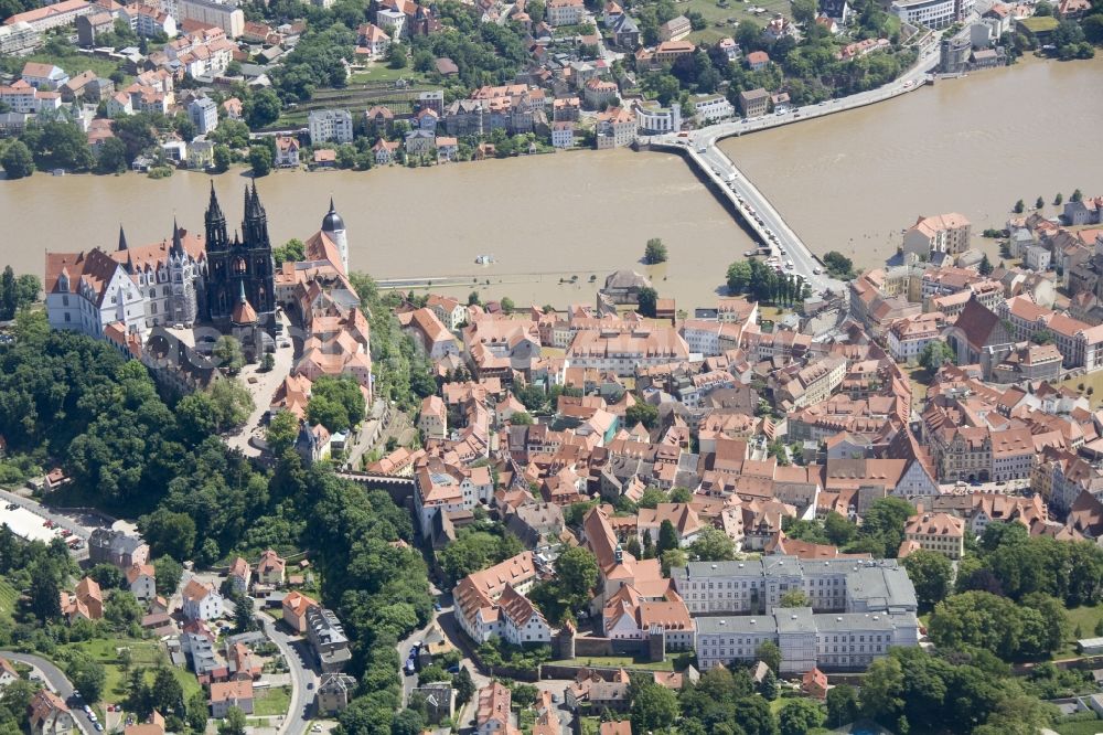 Meißen from the bird's eye view: Flood disaster flood flooding the banks of the Elbe and the surrounding areas in the state of Saxony Meißen